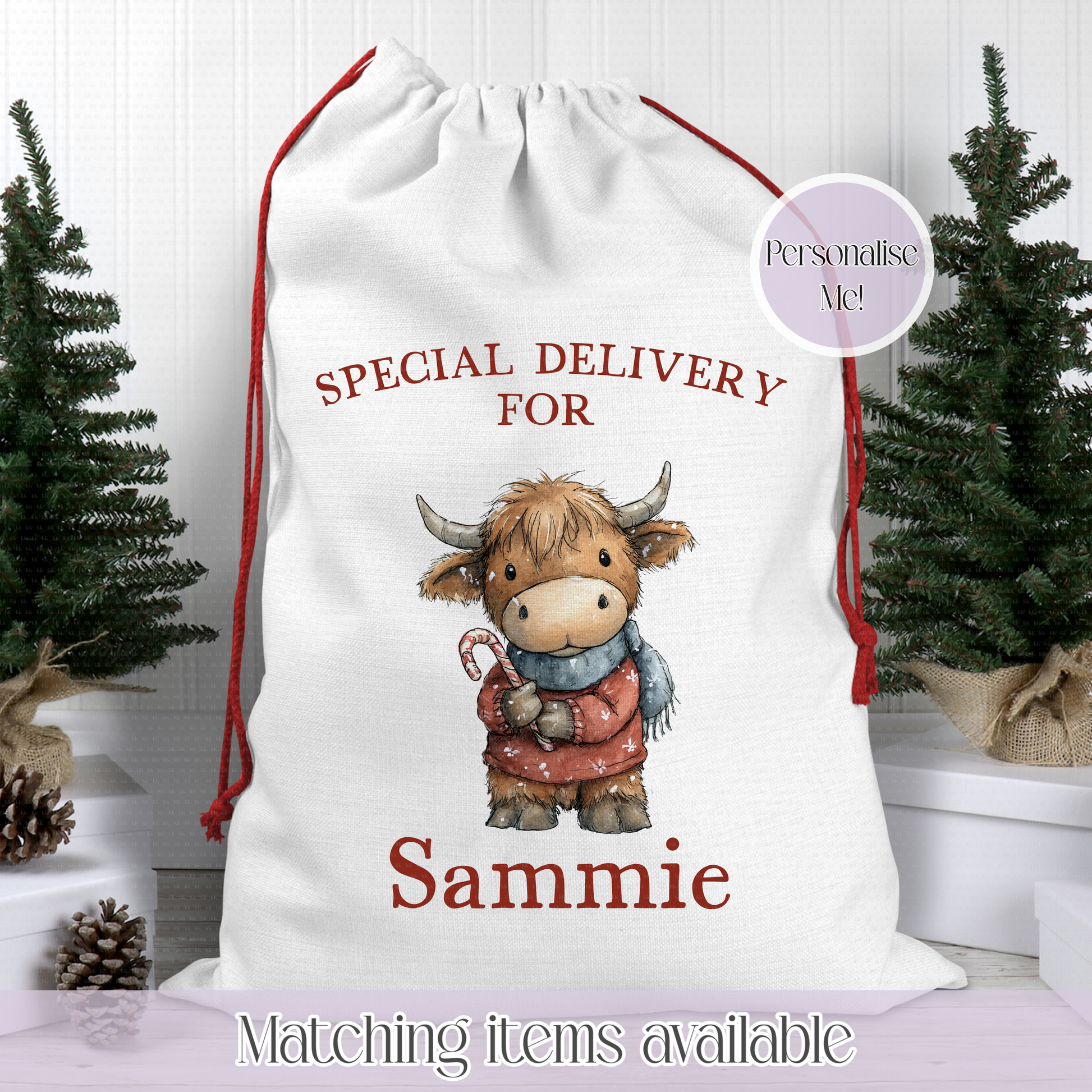 Personalized Christmas sack with a cartoon cow holding a candy cane, sitting on a white surface with Christmas trees in the background.